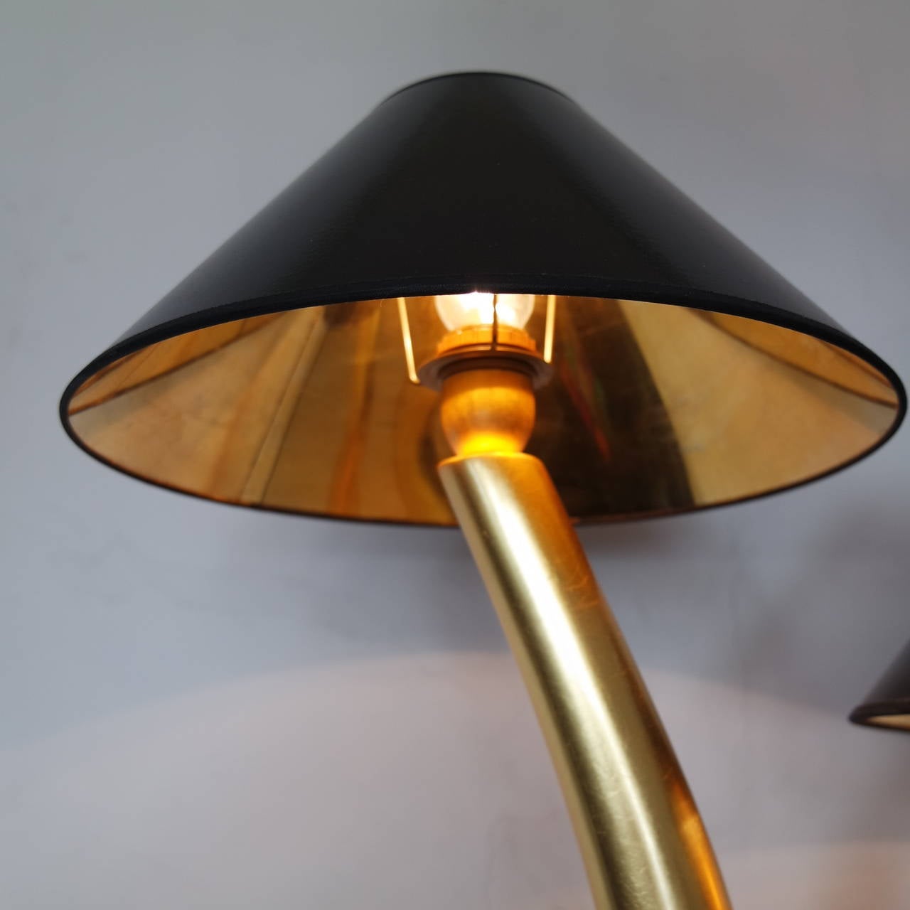 Large resin lamp realized by Philippe Cuny, covered in golden leaf 23,5 carats with black vinyle shades,  signed 