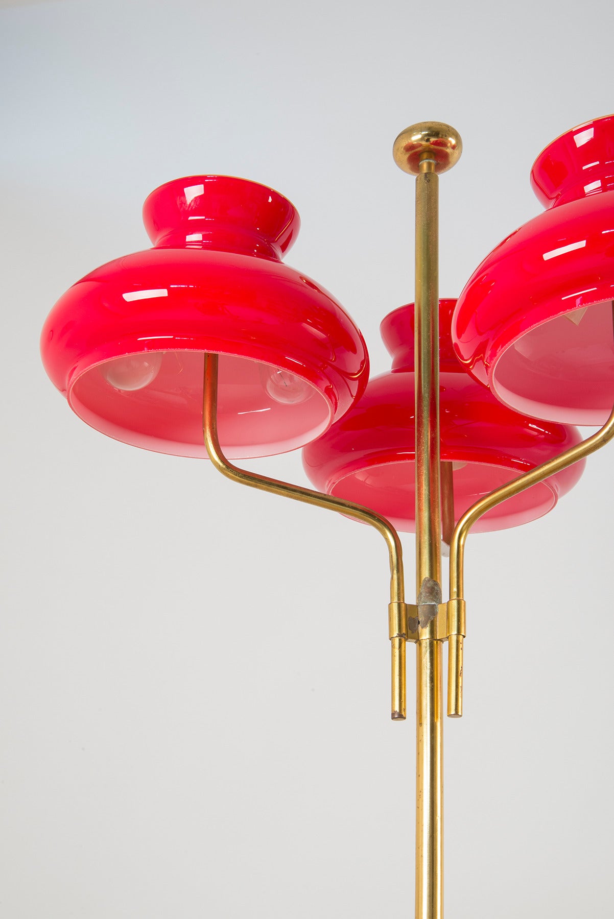 Elegant pair of table lamps manufactured in Italy in the '50s. Burnished brass structures (with different finishings), coated opaline glass shades.