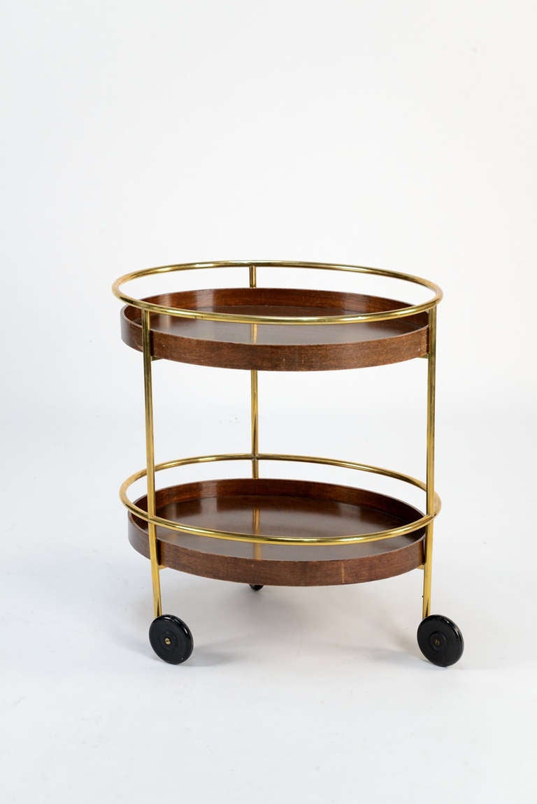 Elegant cart designed by Paolo Tilche, manufactured by Arform in 1960. Wooden trays, brass structure.