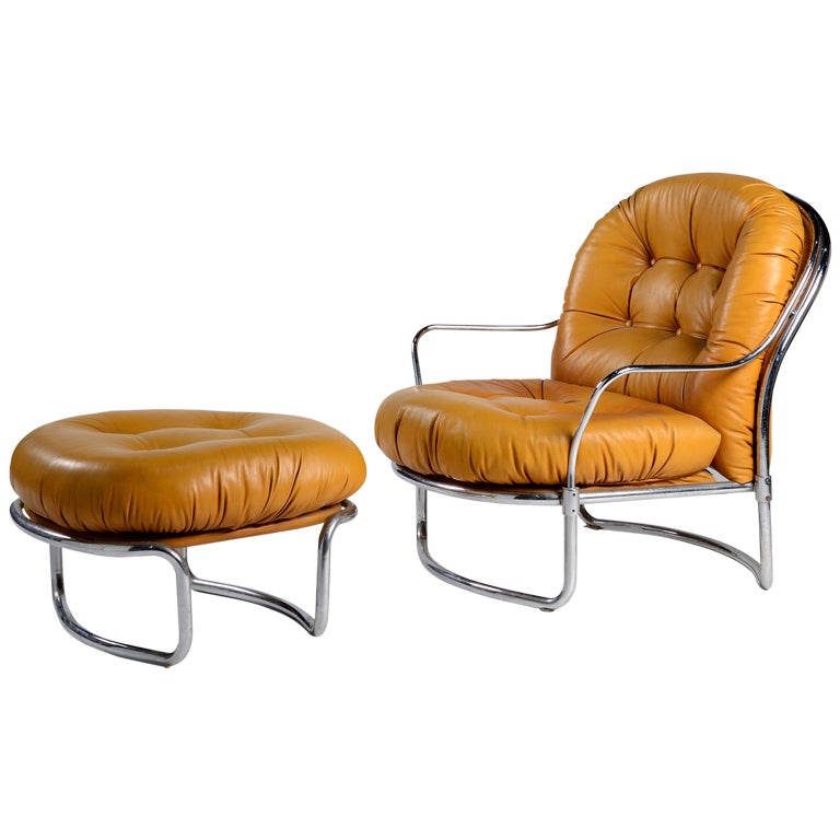 Model 915 leather lounge chair with ottoman by Carlo De Carli