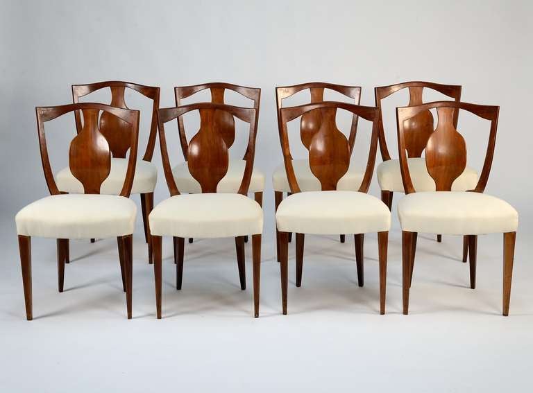 Set of eight dining chairs designed in early 50s or late 40s by Giuseppe Gibelli and manufactured in Italy, mahogany wood, inlaid legs, elegant design of the backrest.