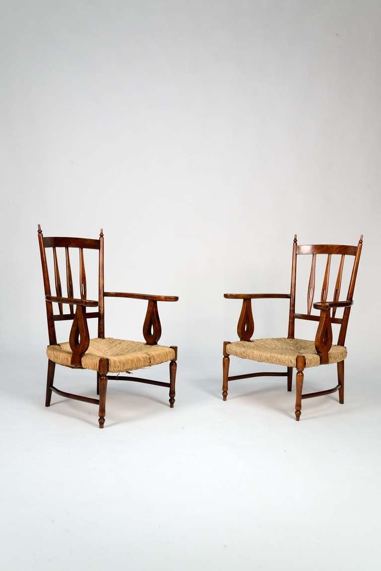 Italian Pair of Paolo Buffa  low armchairs from the 1930's