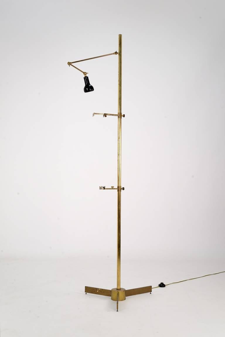 Pair of unusual and exquisitely made brass easels with adjustable light, designed by Angelo Lelli and manufactured by Arredoluce in the 1950s.