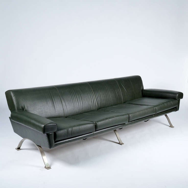 Large 4 seats sofa manufactured by Saporiti in the '60s. Vinyil upholstering, curved metal feet. Good vintage conditions.