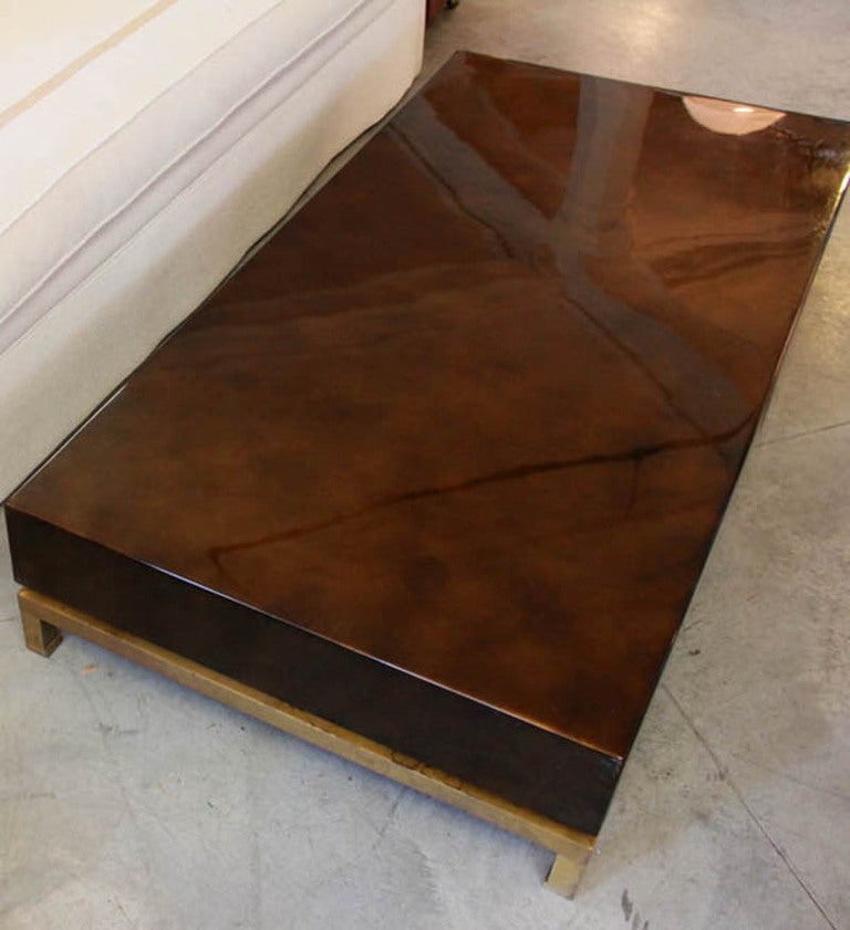 A rare and hard to find Maison Jansen lacquer coffee table with four drawers by Guy Lefevre.
