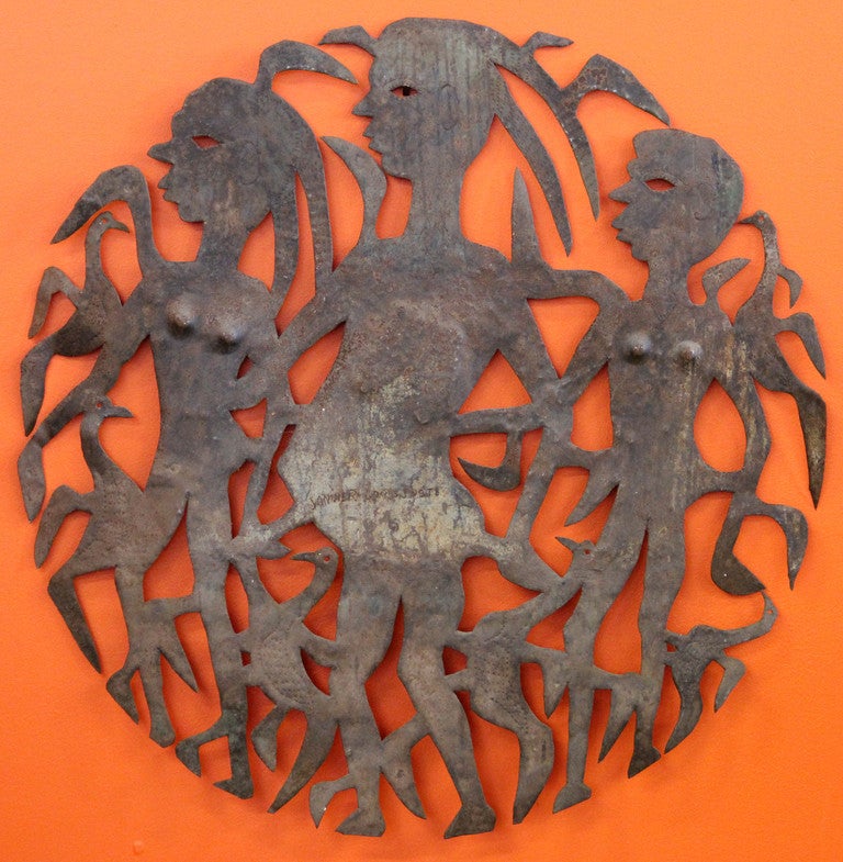 Janvier Louis-Juste (Croix des Bouquets, Haiti) Circa 1960-1970's Recycled steel oil-drum masterfully repurposed to show midwives escorting a woman with child.