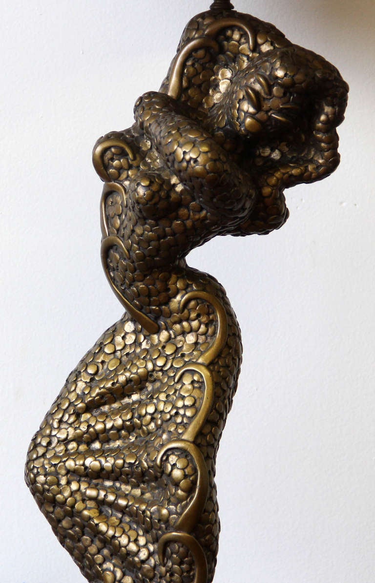 An Unusual Art Deco Style Kitsch CA Pottery Dancer Lamp by Reglor with Original Lampshade.  Shade is in excellent Condition.  Pottery Lamp has minor chipping on back base - please see detail photo.  33