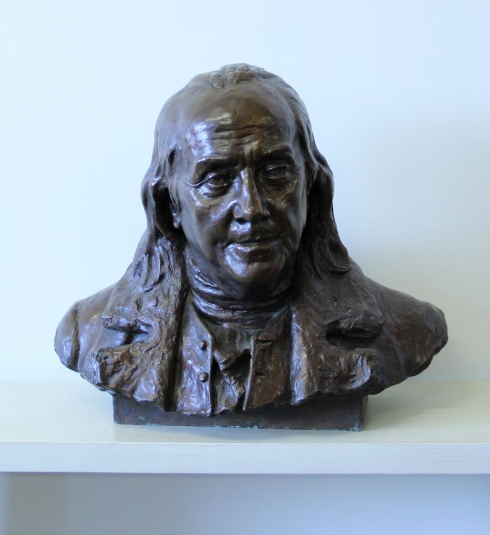 One of two known bronze bust sculptures of Benjamin Franklin by noted American artist John J. Boyle (1852-1917). This sculpture is unique from the other example in that it incorporates a larger base and is finished with a rich brown patina. This