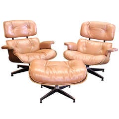 Pair of Charles and Ray Eames 670 Rosewood Lounge Chairs with one Ottoman Pair of Charles and Ray Eames 670 Rosewood Lounge Chairs with one Ottoman