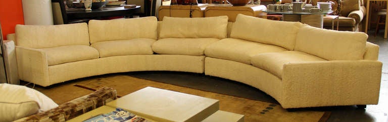 Great form and comfort in this Milo Baughman for Thayer Coggin circular sectional sofa. Textured off white upholstery can be used as is. Will have re-cleaned prior to shipping if requested.
Measurements
Approx 144