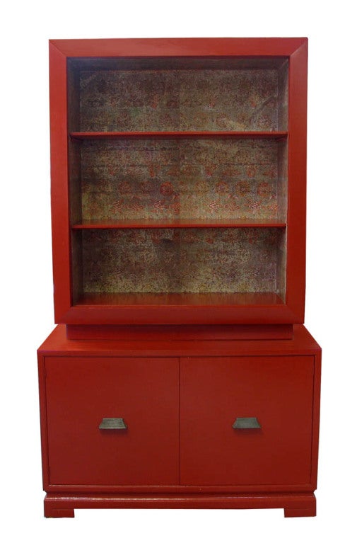 Striking Asian style cinnabar lacquer two door cabinet by Drexel with antique wallpaper accents.

Base measures 28.25
