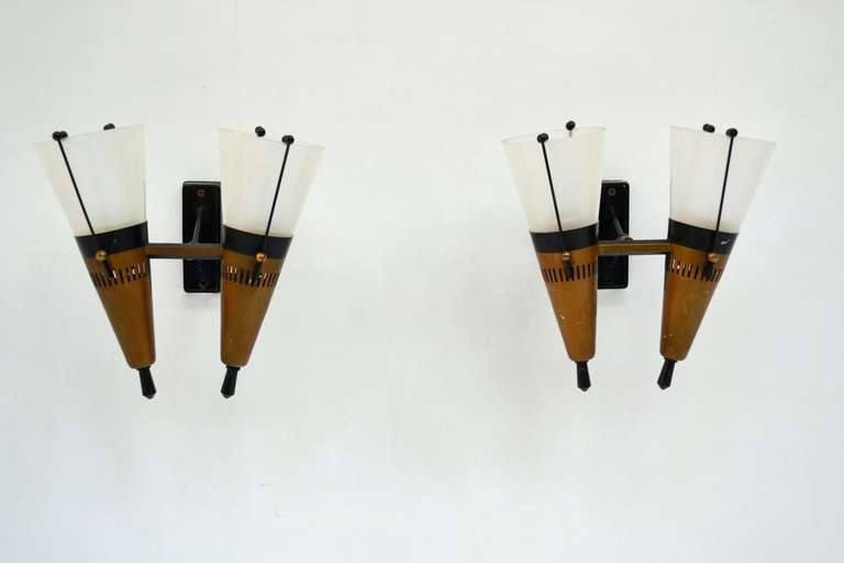 Pair of sconces, metal gold and opal glass, 1960s, Stilnovo attributed.