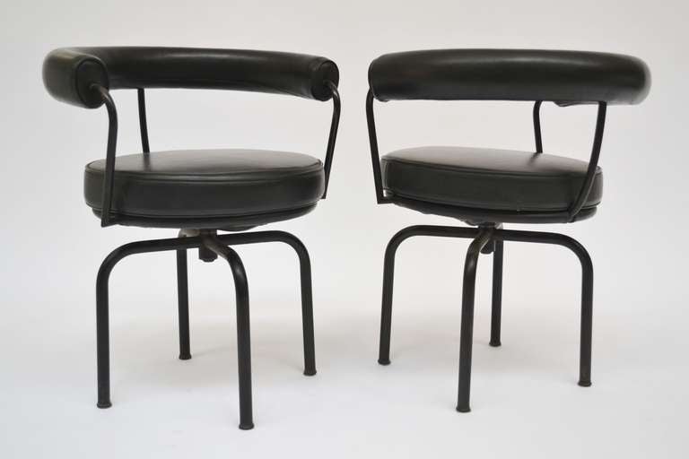 Pair of chairs by Cassina, designers Le Corbusier mod. LC7, original skay cover