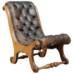 Antique A low leather x frame chair