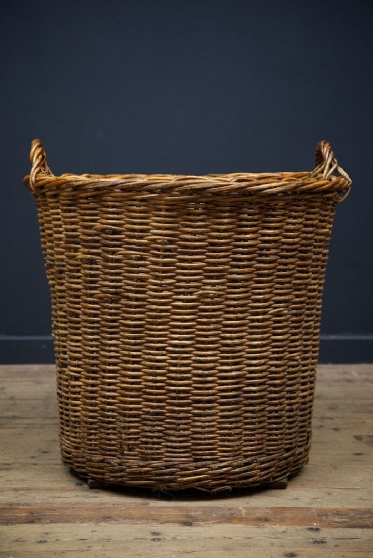 Large hand woven mill basket. 

Great colour and very authentic. 

English circa 1890. 

H:80 W:75 CM