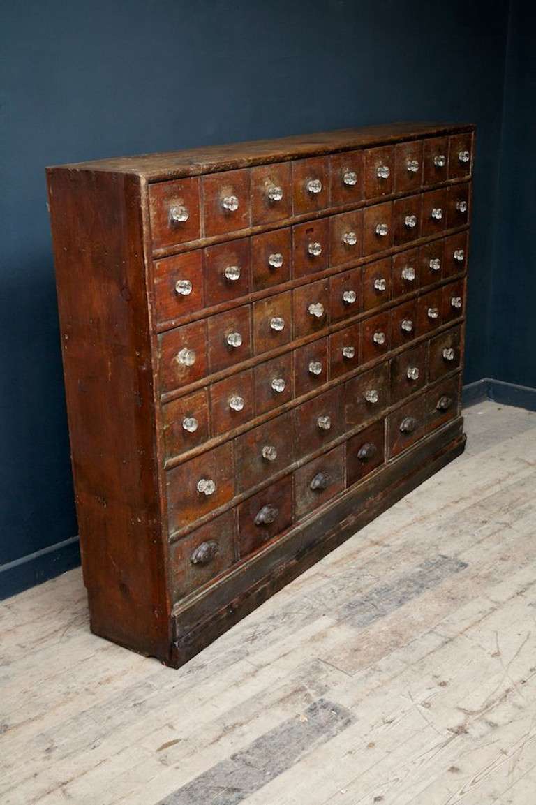 A large bank of 19th century seed drawers.
Mahogany drawer fronts, all originally fitted glass handles and cast iron pull handles.
Unrestored surface condition, good colour and scale.
Removed from a market gardeners warehouse in the north west of