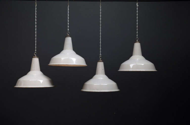 A run of these classic 1940s Grey Industrial pendant lights by British Company 