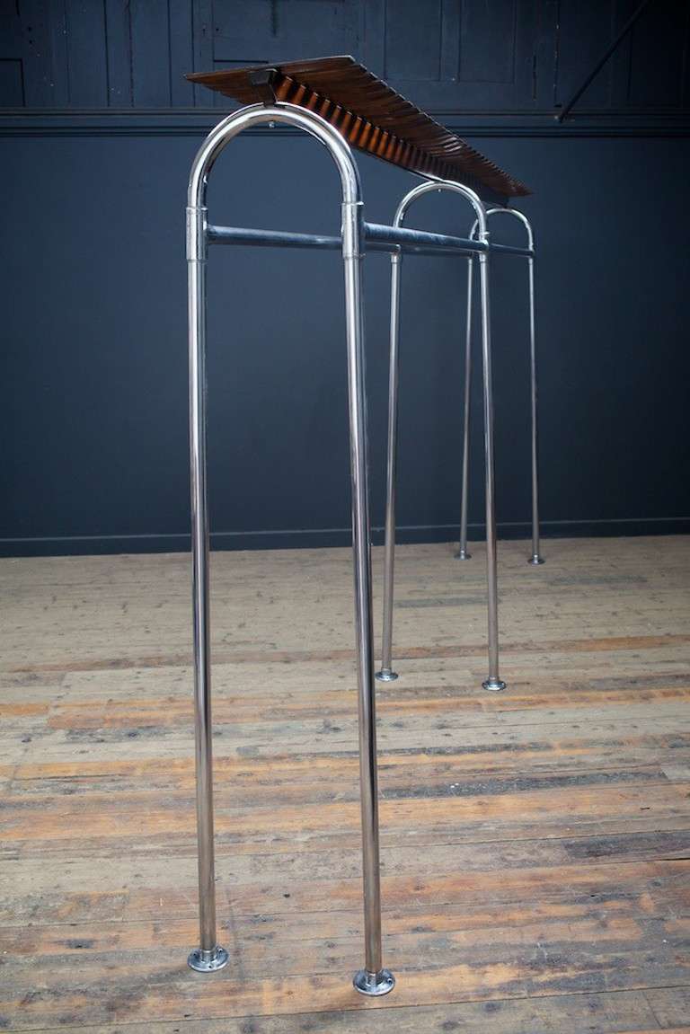 We have a pair of these large nickel plated floor standing coat racks both with mahogany shelf above.
Removed from the Rowntrees choclate factory, York.
Marked 1953.
Price is per rack.
Also one single sided wall mounted rack to match.