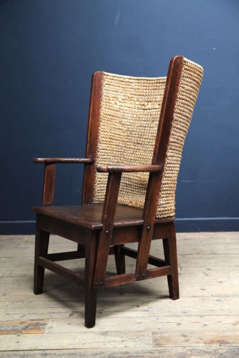 An orkney armchair. 

Seagrass curved back on pritimive pine frame. 

1880-1900. 