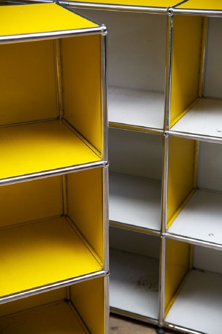 Powder coated steel modular shelving units, supported by chrome tabular frames. 

Strong but not heavy duty, used for document storage. 

Four (4) available, price is per unit. 

1970s. 

H:110 W:152 D:37 CM