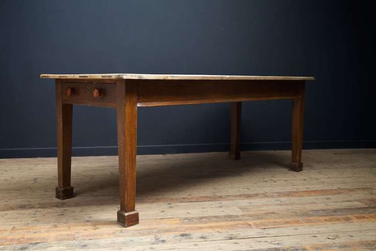 A Simple and untouched painted pine scrub top kitchen work or prep table.
Single drawer with a turned elm handles to each end.
English mid 19th Century.
Height from floor to table base 66cm.

Height: 82 cm Width: 211 cm Depth: 86 cm