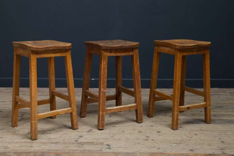 Simple sturdy lab stools of good form.
Beech frame with shaped oak or mahogany seats.
English Circa 1900.
Price is per stool, 50 available.
Height: 59 cm Width: 37 cm Depth: 30 cm