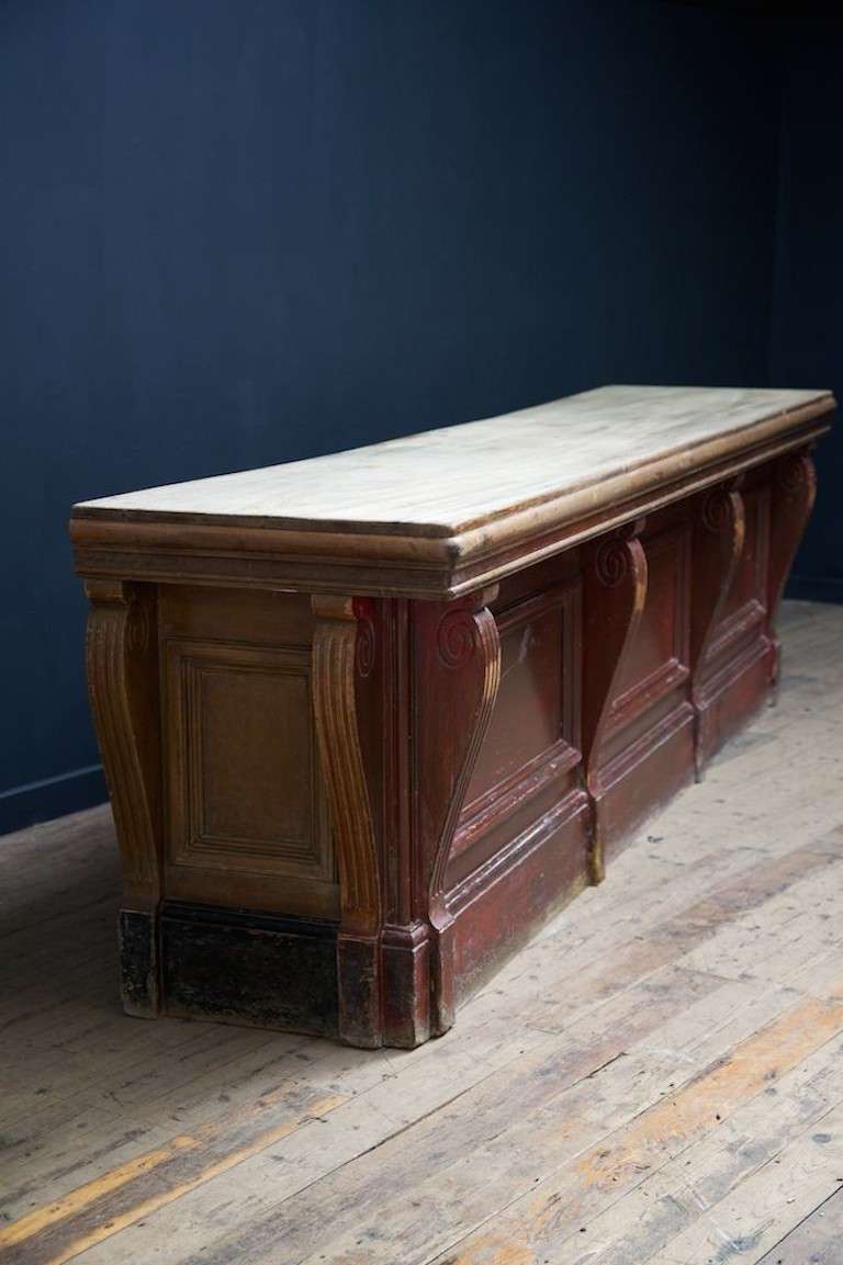 A bar or shop counter.<br />
The top is a single plank of teak, scrubbed to a matt finish after years of use.<br />
Exceptional original painted surface, unrestored, original, found condition.<br />
English, circa 1850.<br />
<br />
Height: 92 cm