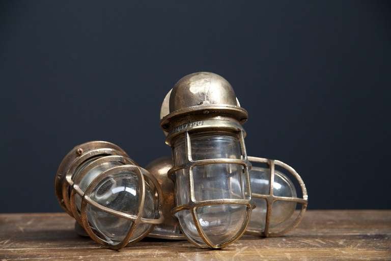 We have a large run of these marine passageway lights. 
Bronze throughout, fantastic quality, removed from the Pauluhn USA. 
American, early twentieth century. 
Completely re-wired, price per light.