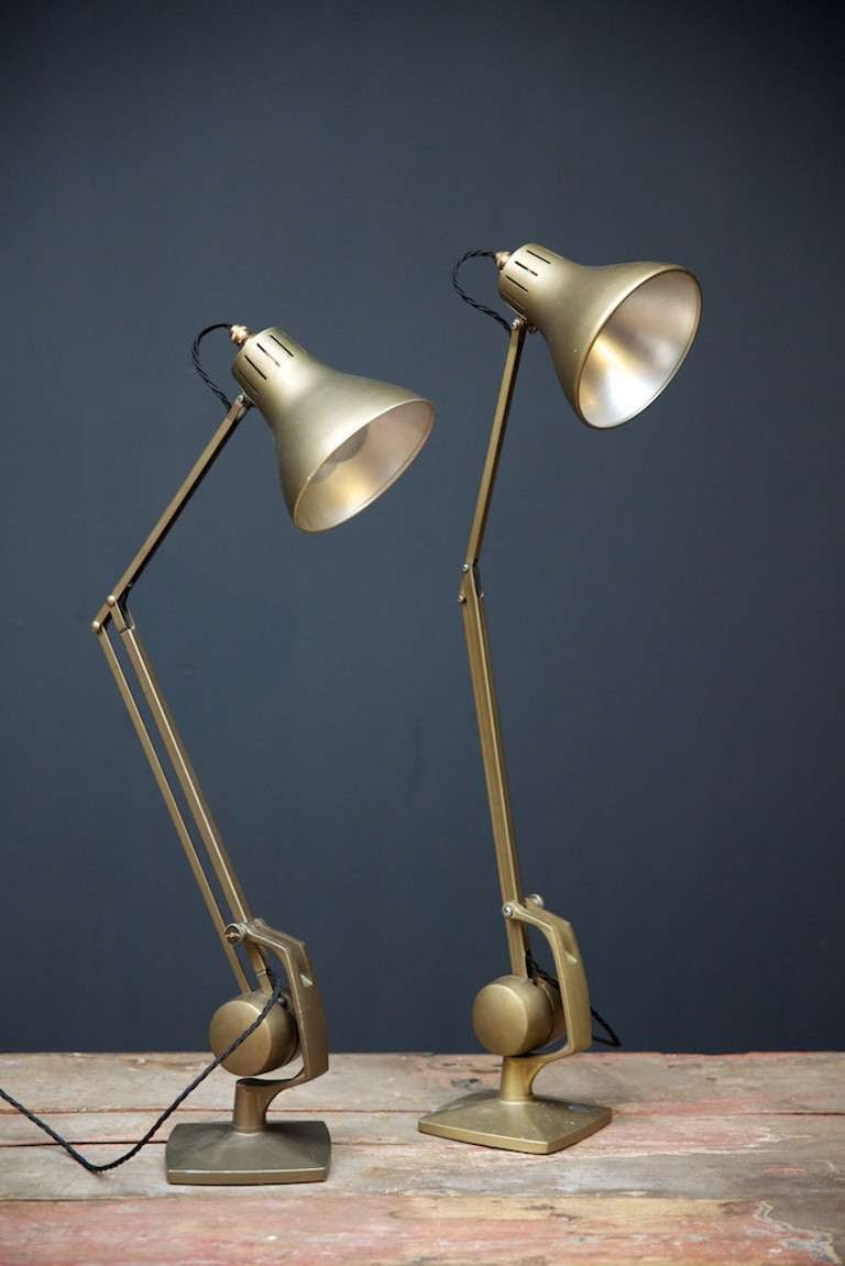 A near pair of Hadrill & Horstmann iconic counterpoise lamps. 
Original condition with some wear to the original gold paint, finished with black core cable and flick switch. 
English, 1950s. 
Price for the pair, or £350 per lamp.