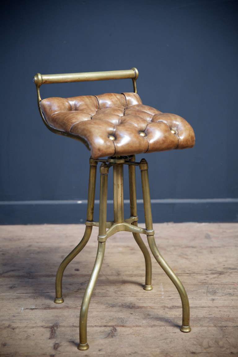 Brass and leather music stool