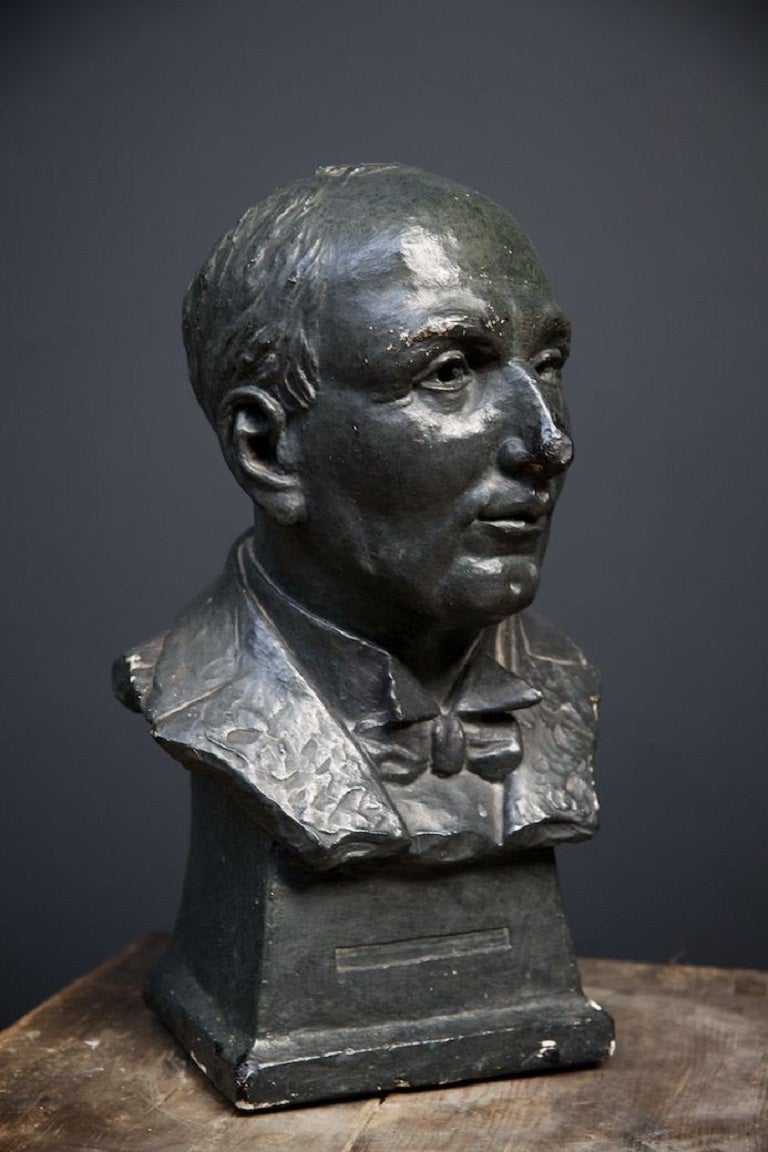 A black patinated plaster male bust. 

European 1920s. 

H: 50 W: 28 D:23 CM