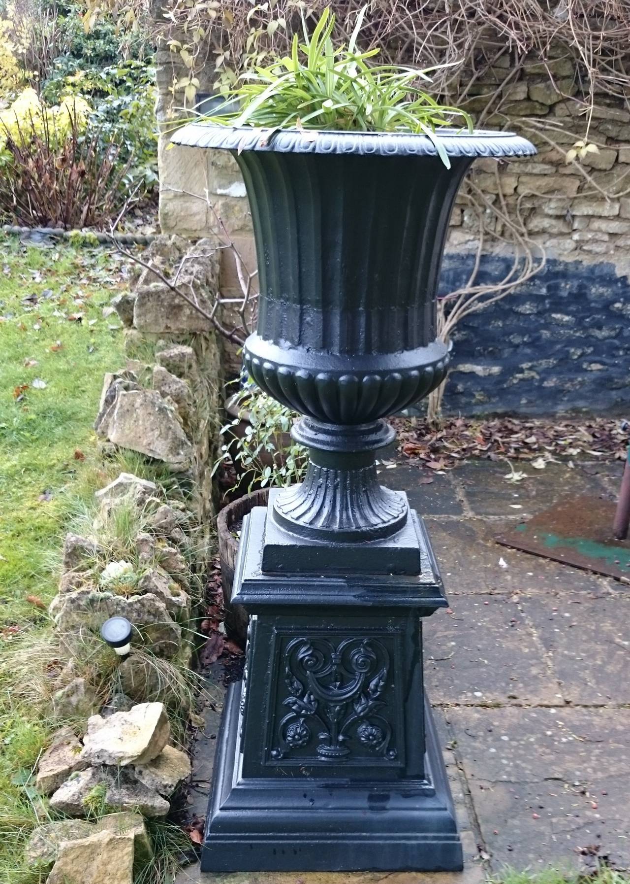 Pair of Cast Iron Urns For Sale at 1stDibs