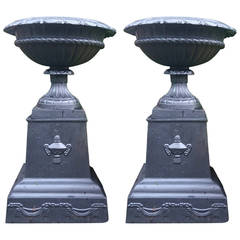 Pair of Cast Iron Urns