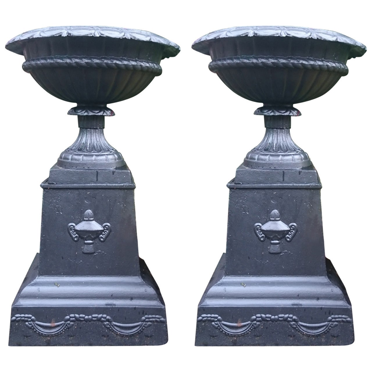 Pair of Cast Iron Urns