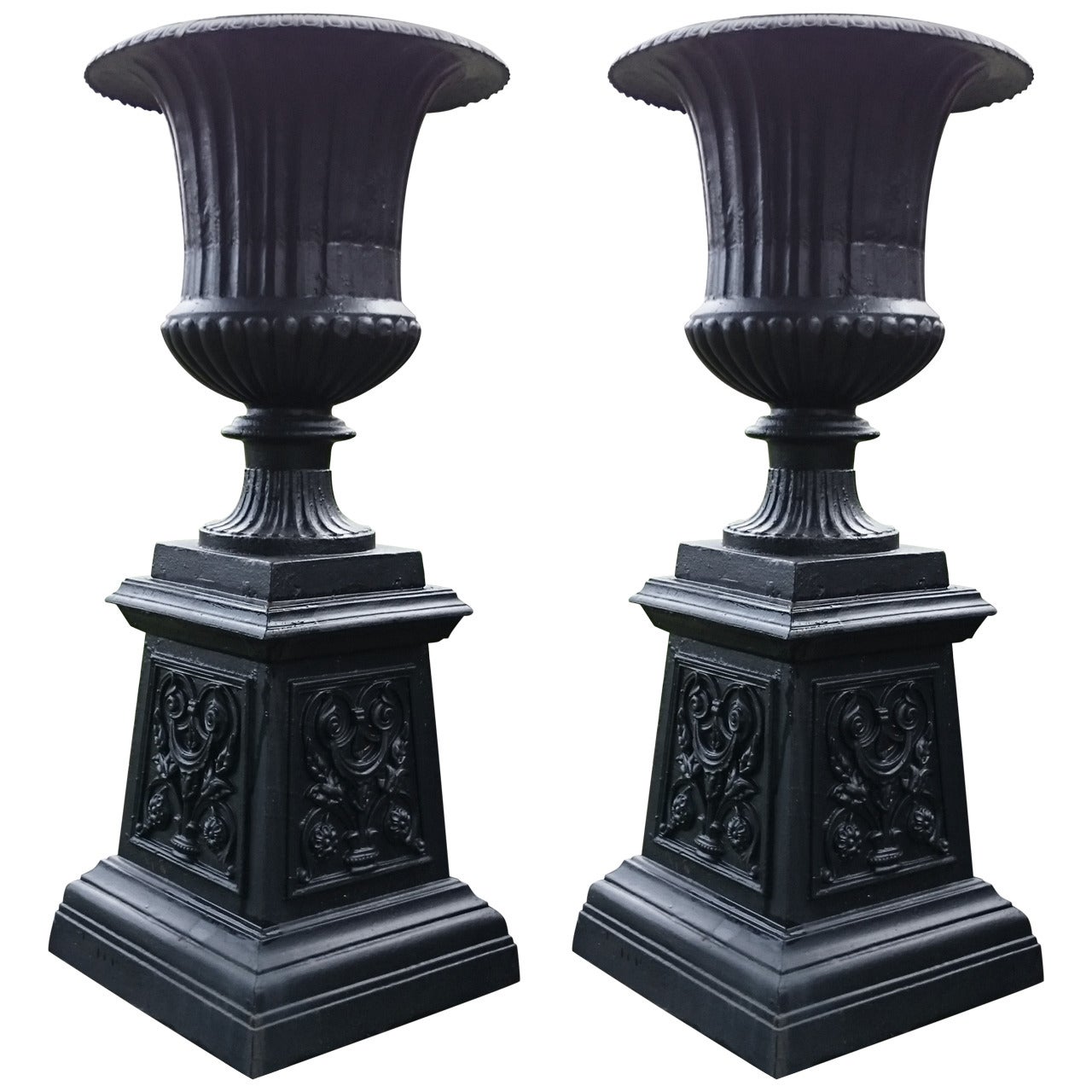 Pair of Cast Iron Urns For Sale