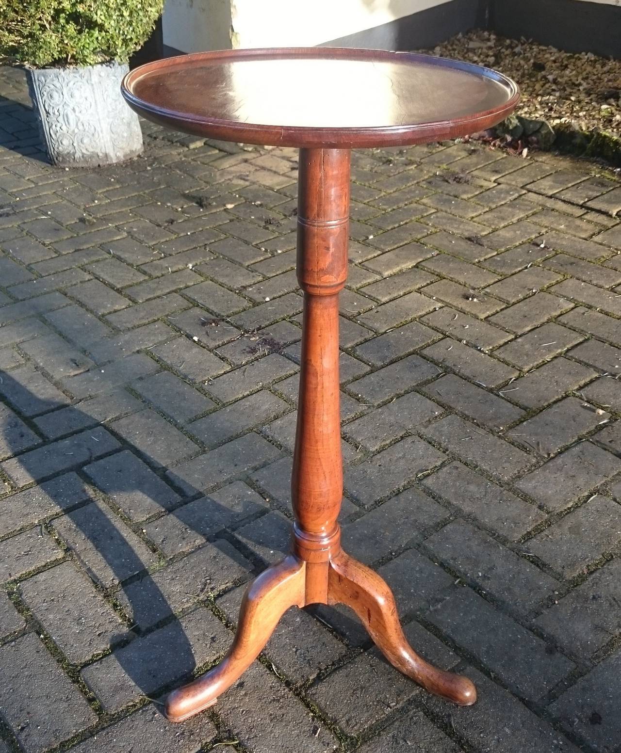 Antique yew wood tripod table / lamp table / wine table. To those in the know this timber needs no introduction. Yew wood has a unique way that its fine grain lines fade to a deep golden colour with the passage of time. 

English circa 1810