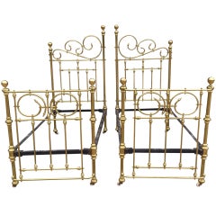 Antique Symmetrical Iron Frame Brass Beds