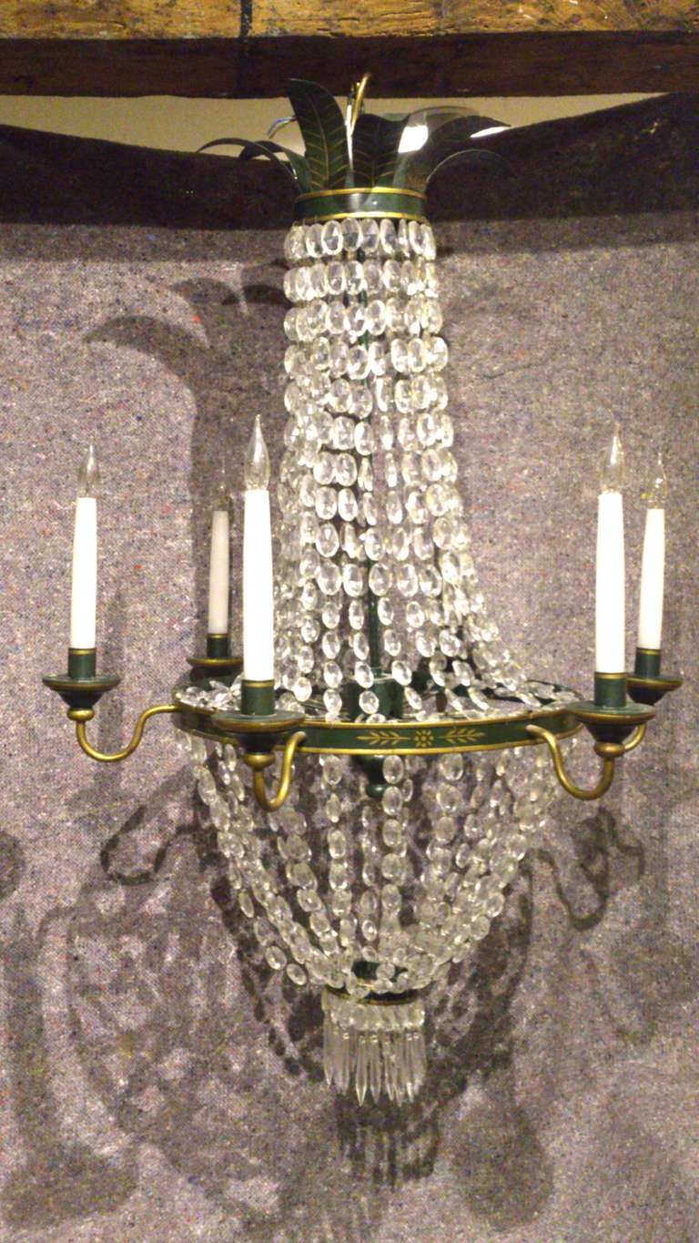 This good scale antique chandelier walks the line between vernacular charm and large country house opulence.

The cut crystal glass reflects the light beautifully, these photos do not do it justice.

French circa 1890

28
