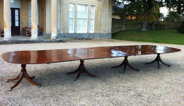 Extremely fine and rare late 18th century mahogany four-pedestal dining table by Gillow, English, circa 1790. All original, this dining table bears the label or stair and Andrew who supplied it to the previous owners, circa 1900.

Perhaps the best