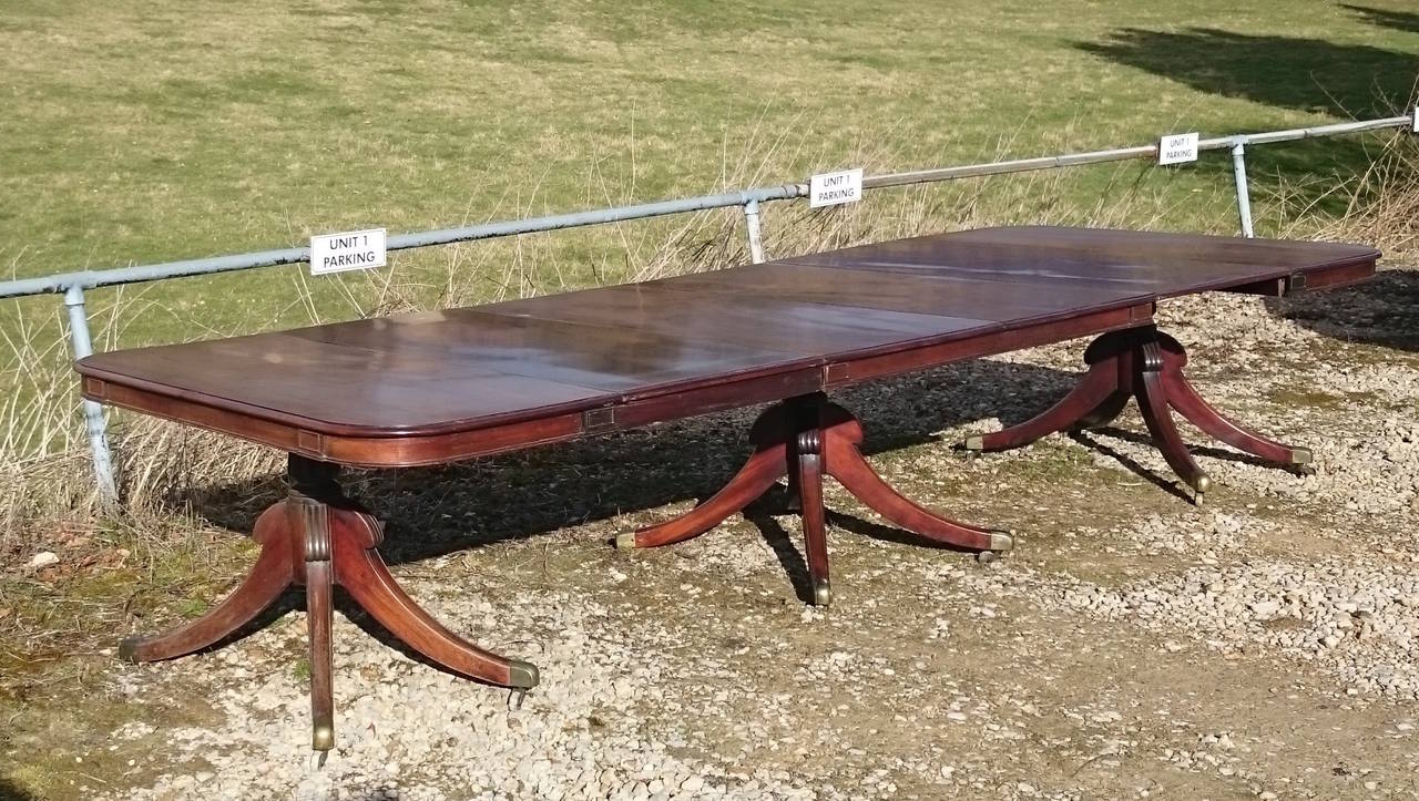British Unusually Large and Imposing Three-Pedestal Antique Dining Table For Sale