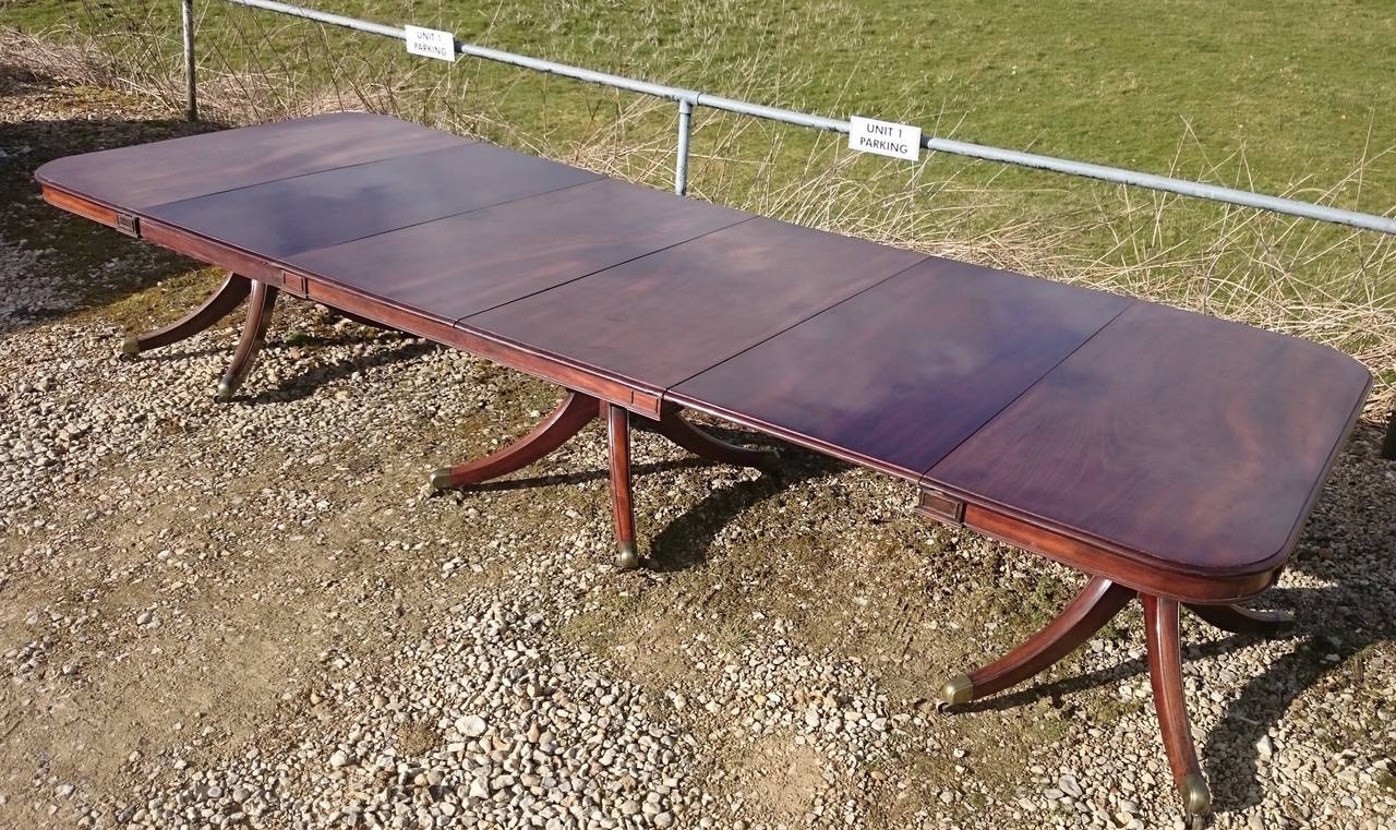 Unusually Large and Imposing Three-Pedestal Antique Dining Table In Good Condition For Sale In Gloucestershire, GB