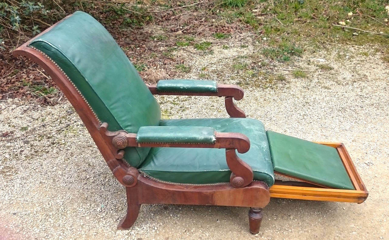antique recliner with footrest