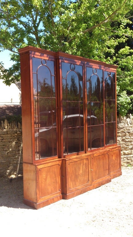 George III period mahogany breakfront bookcase of gargantuan proportions, one of the most elegant we have ever had, this bookcase is wonderfully constructed and with elegant lines and thin glazing bars looks light and elegant despite its physical