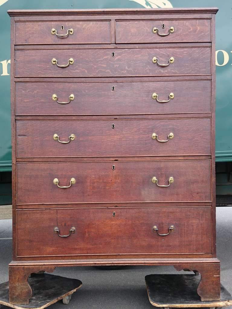 Large (but not imposing) antique oak chest. This chest is made of a fine cut of dense grained oak with lots of lovely medullary rays and no knots. It dates from the George III period so it has all the good features you would expect from this era