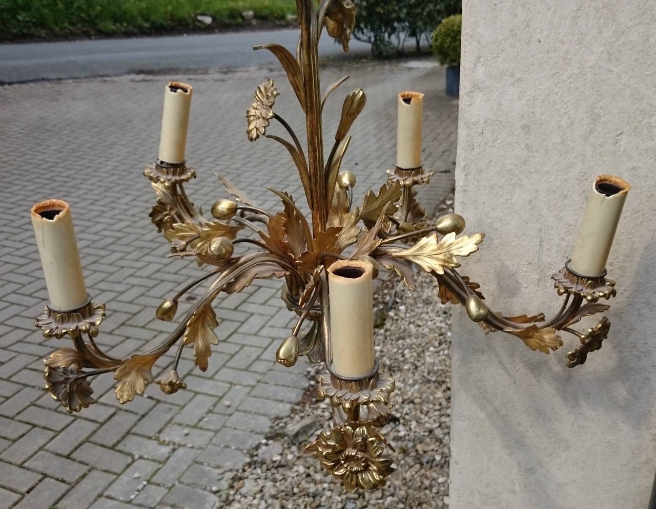Antique five branch chandelier made of gilt brass or ormulu with extensive foliate decoration. 

French circa 1920 

20