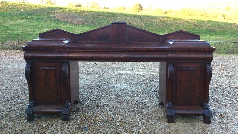 Very fine quality period George IV antique mahogany sideboard of impressive architectural form, with wonderful flame mahogany veneers and all mahogany lined drawers, doors and sliders, the inside contains linen sliders, there are three cutlery