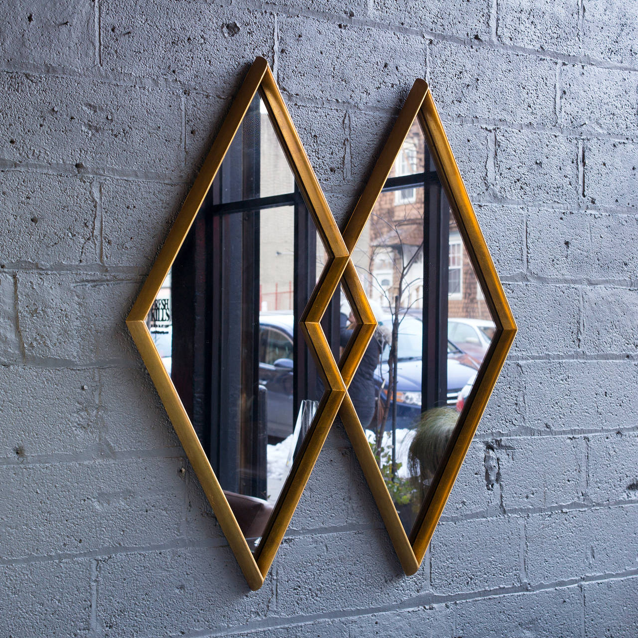 Warm, gold leaf finish on wood frame with deep, contoured bevel. 

All original in fine condition.