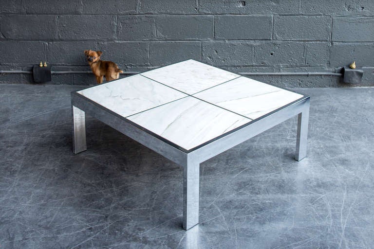 Versatile coffee table/end table with chrome plated steel base and four inset Italian marble squares.
