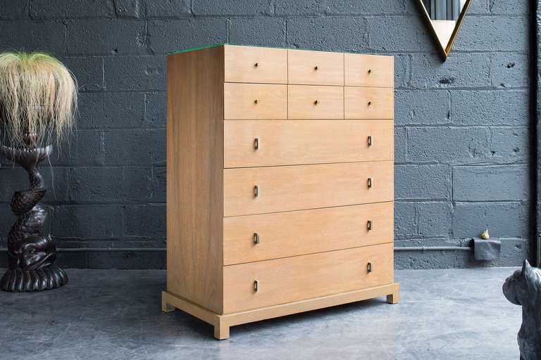 Six drawer cabinet on Asian style platform base.

Original cerused finish with cream and gray tones. 