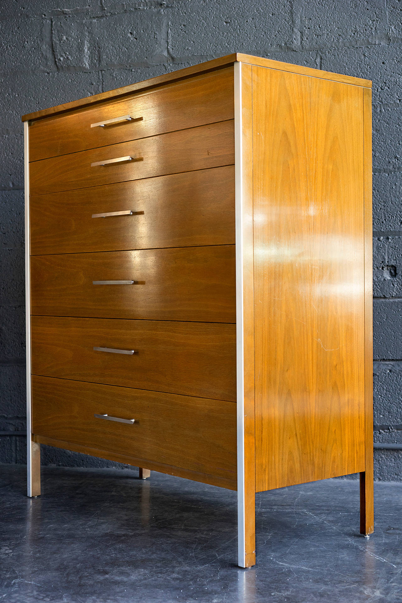 Handsome, understated and Classic Mid-Century dresser in good, all original condition. Manufactured by Calvin Furniture.